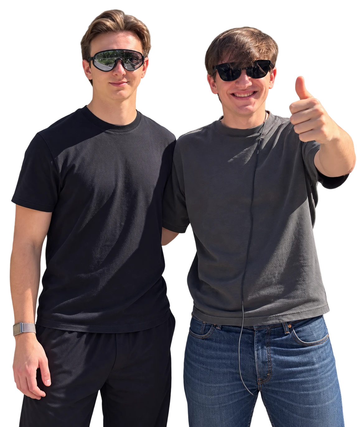 Stefan and Robert standing together wearing glasses, one smiling and giving a thumbs-up.